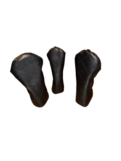 black cross hatch driver wood and hybrid head covers on a white background