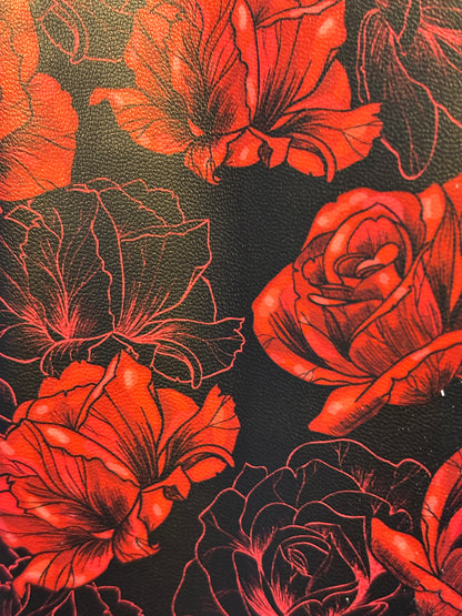 Driver head colour side view with red and black floral pattern on a white background