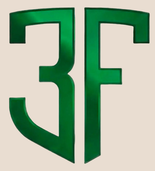 A stylized green 3F logo or emblem with a glossy, metallic finish on a plain white background.