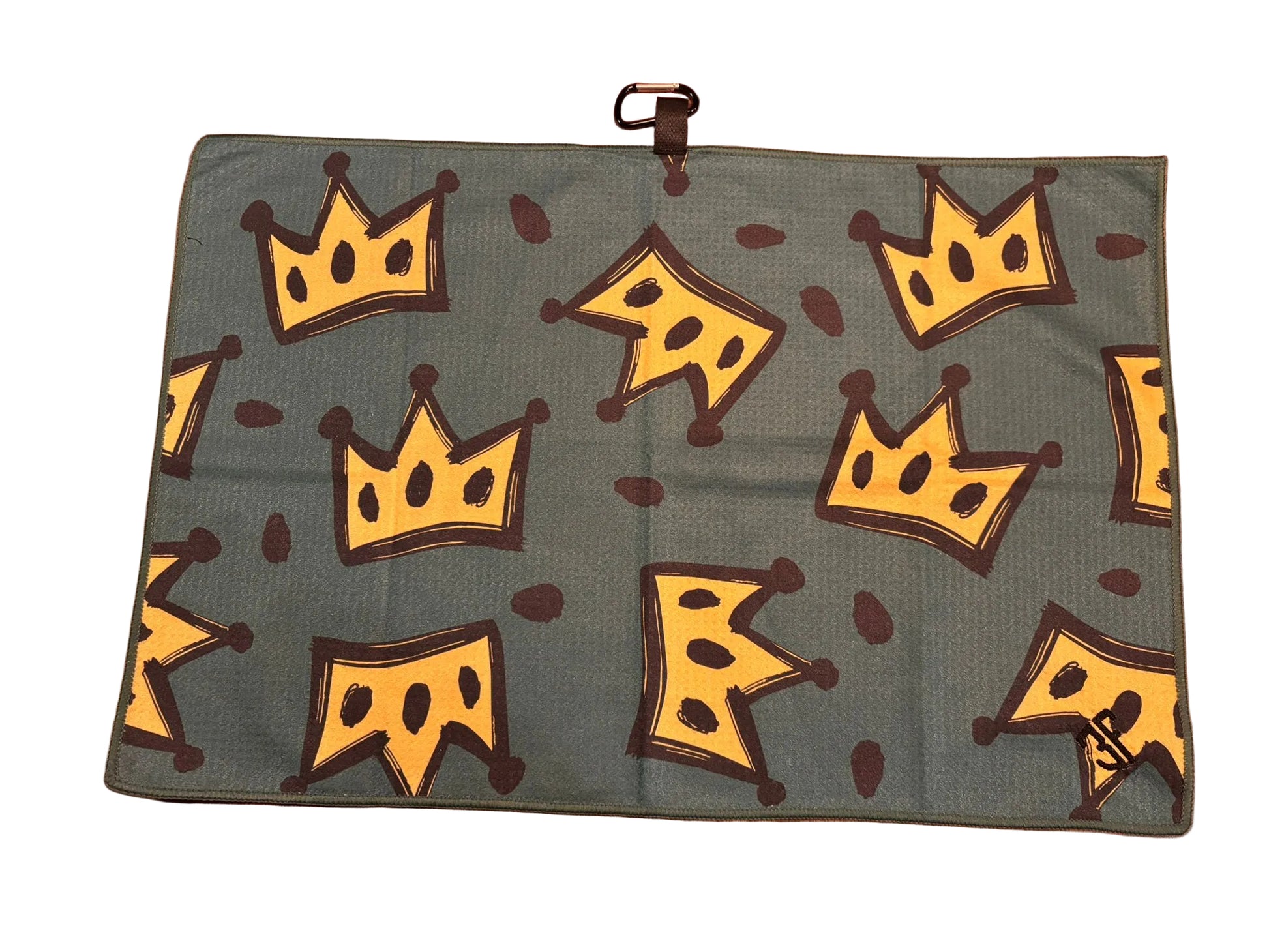green waffle golf towel with black and yellow crown detailing with carabiner with white background