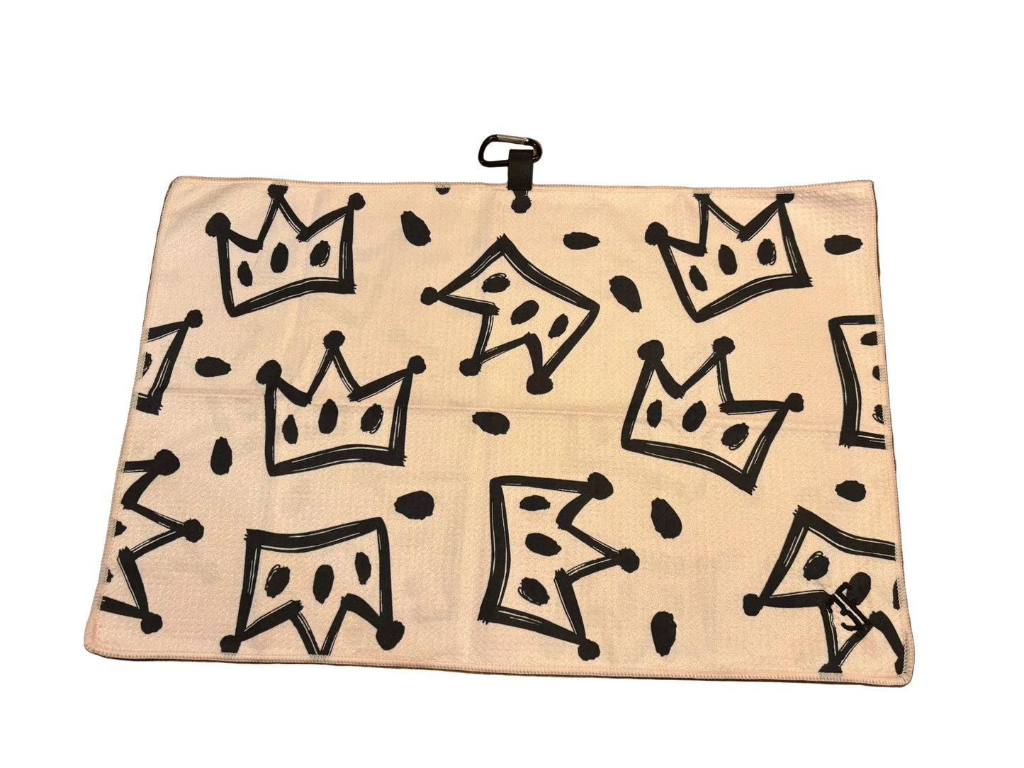 light pink waffle golf towel with black crown detailing on a white background