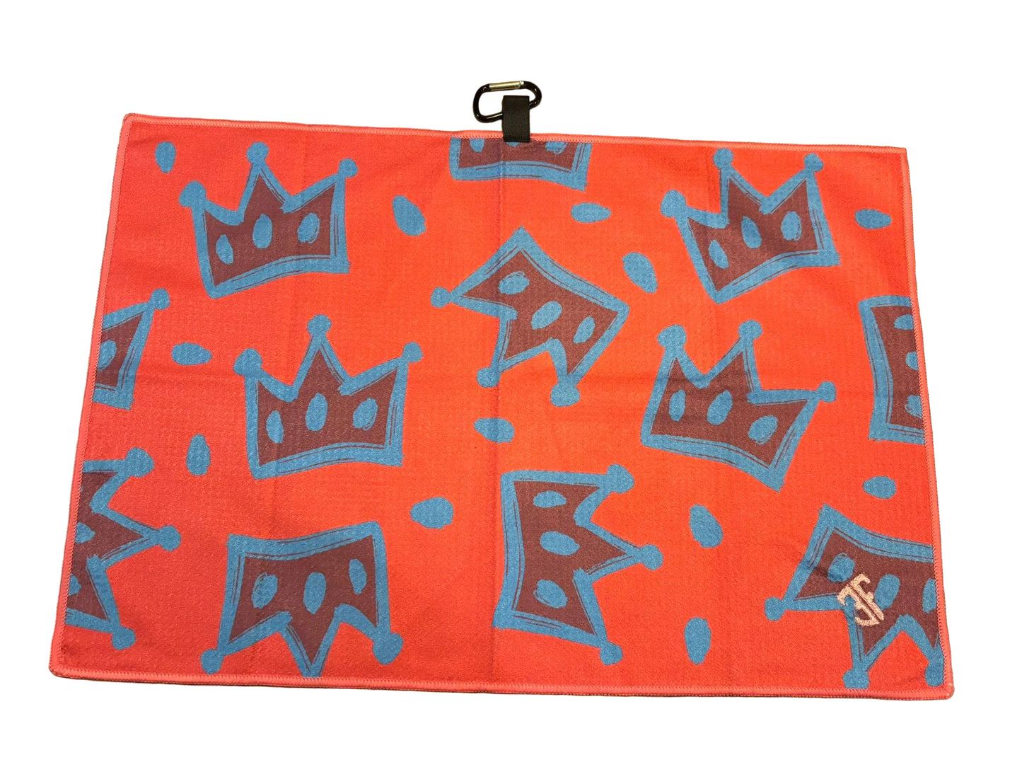 pink waffle golf towel with blue crown detailing with carabiner with white background