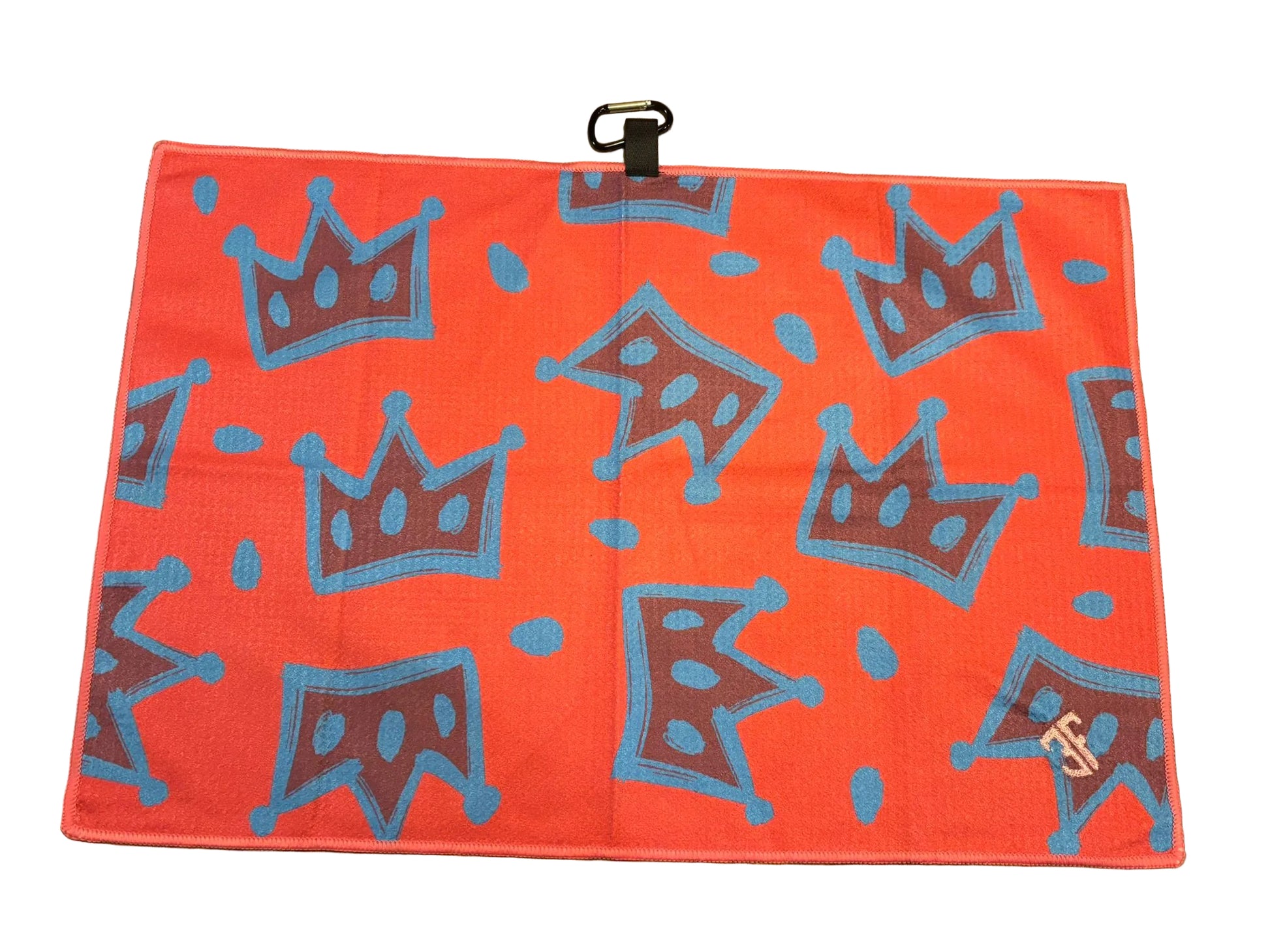pink waffle golf towel with blue crown detailing with carabiner with white background